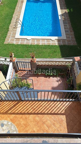 Foto 3dca726c-4383-40cc-bbe4-3a59518043fd. Casa aparellada amb xemeneia calefacció aparcament piscina a Torredembarra