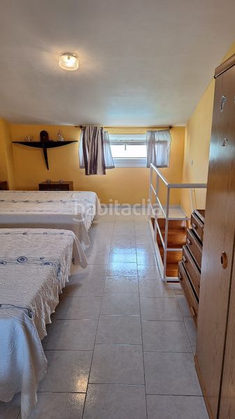 Foto 40ed0a66-fd8c-4e54-8e09-f6f225c45b78. Casa aparellada amb xemeneia calefacció aparcament piscina a Torredembarra