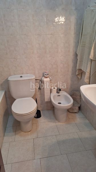 Foto 686ca685-7420-48c6-855e-c085ef9fea4a. Casa aparellada amb xemeneia calefacció aparcament piscina a Torredembarra