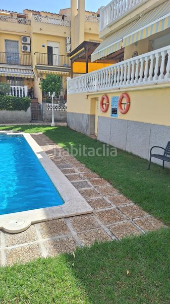 Foto 735b5f39-8798-4c1f-aff7-cd7d1760bf3a. Casa aparellada amb xemeneia calefacció aparcament piscina a Torredembarra