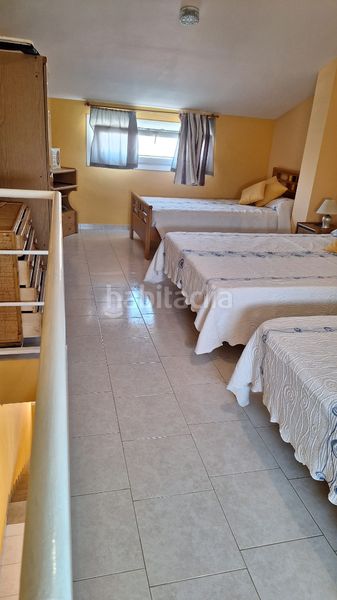 Foto 7b6d2103-9952-4e53-9696-c164b9f834b7. Casa aparellada amb xemeneia calefacció aparcament piscina a Torredembarra