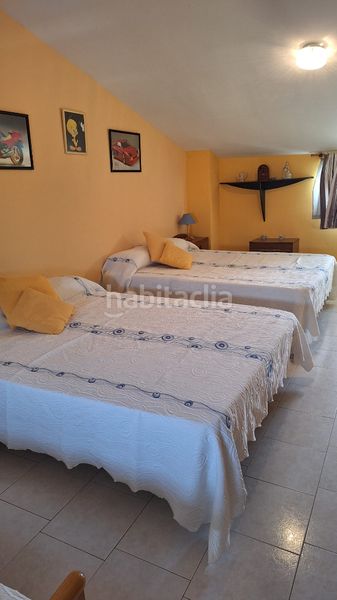 Foto b1a564fc-b2df-4cc9-81bf-5d27f058bb88. Casa aparellada amb xemeneia calefacció aparcament piscina a Torredembarra