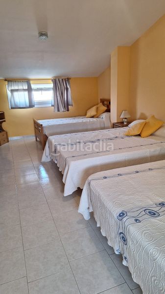 Foto db6ada2f-e2e4-4a9a-89ae-67a8ece5c05d. Casa aparellada amb xemeneia calefacció aparcament piscina a Torredembarra