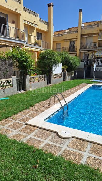 Foto e3788837-cb56-46e2-9013-1e05aab37e51. Casa aparellada amb xemeneia calefacció aparcament piscina a Torredembarra