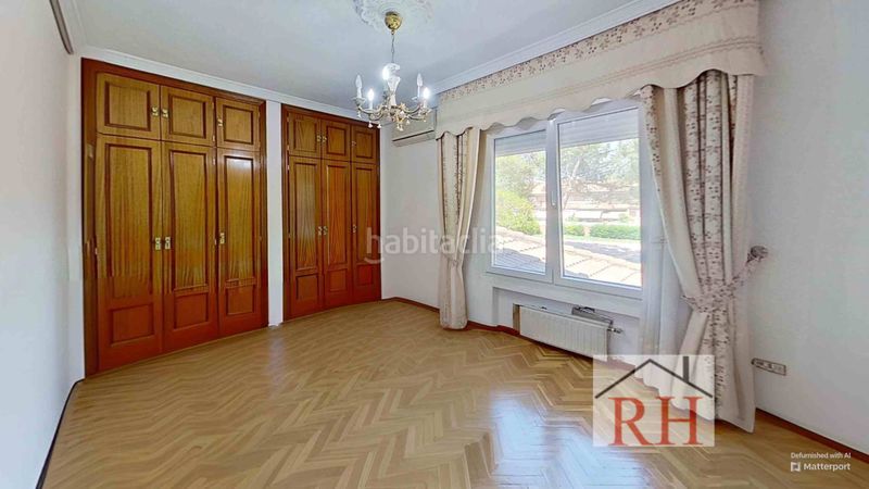 Foto dac8f651-beba-4c29-814b-bb9769aa9fe9. Casa adossada amb xemeneia calefacció aparcament a Alcalá de Henares