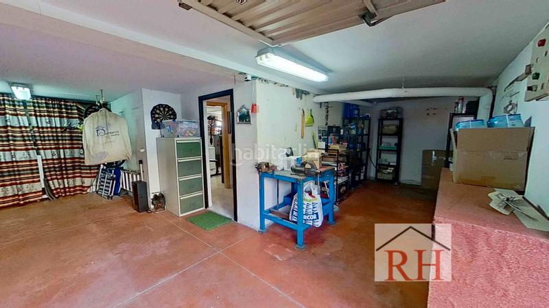 Foto af227bd5-c27e-41b6-adb3-006091a55d4c. Maison jumelée avec cheminée chauffage parking dans Alcalá de Henares