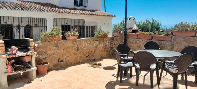 Foto 4b7811af-31f6-4a3d-960c-f97b21a51ff7. Casa adossada amb xemeneia aparcament piscina a Chullera Manilva