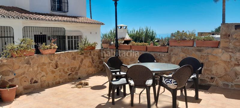 Foto 2e0fd30b-3fcb-4aa1-8238-2336f8ad95a5. Semi detached house with fireplace parking pool in Manilva