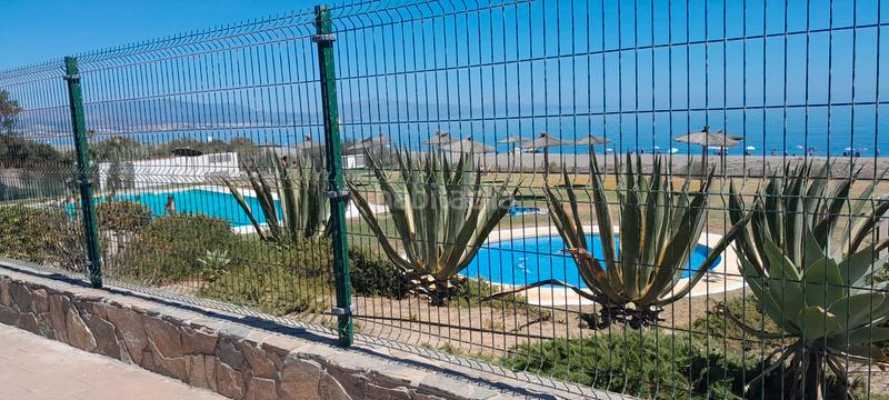 Foto 8450c574-f515-43bb-8e40-41241f6d27ae. Semi detached house with fireplace parking pool in Manilva