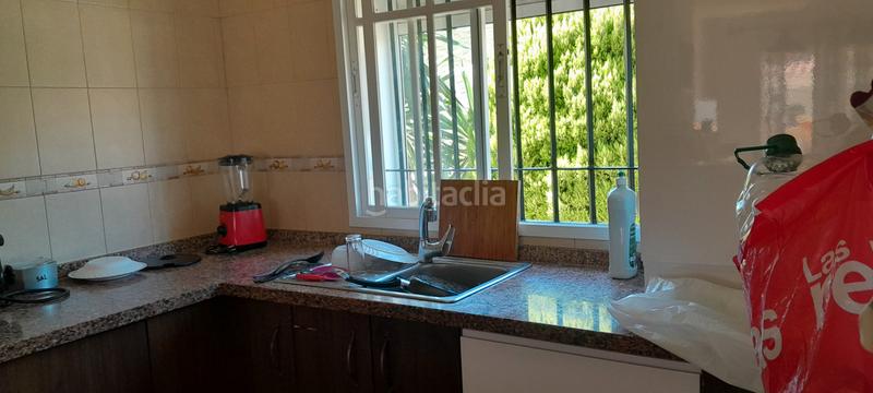 Foto cfd58234-4e1e-4949-a4ab-b92cdc5a75bb. Semi detached house with fireplace parking pool in Manilva