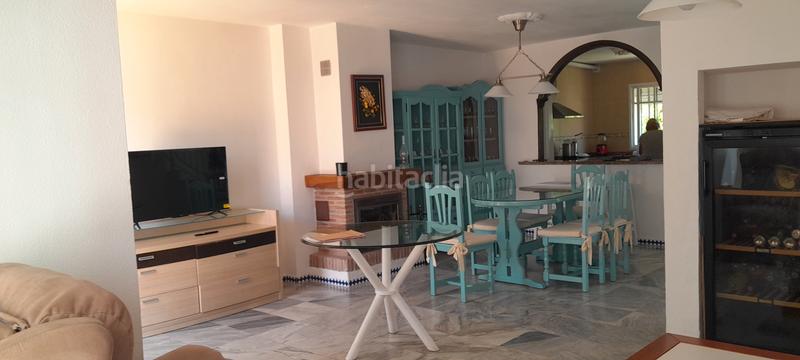 Foto f8b4e72b-729e-4b6f-8c32-9717da232035. Semi detached house with fireplace parking pool in Manilva