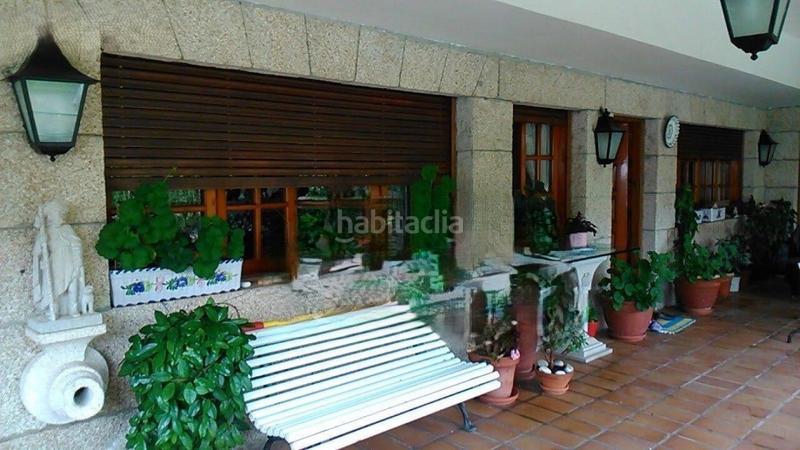 Foto 16968b37-cf68-4e0d-bad5-2da42ec74008. Chalet mit parking in Panxón Nigrán