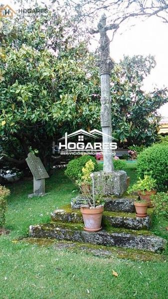 Foto 4d4509a7-e6cd-499b-b779-59c1bad3c963. Chalet mit parking in Panxón Nigrán