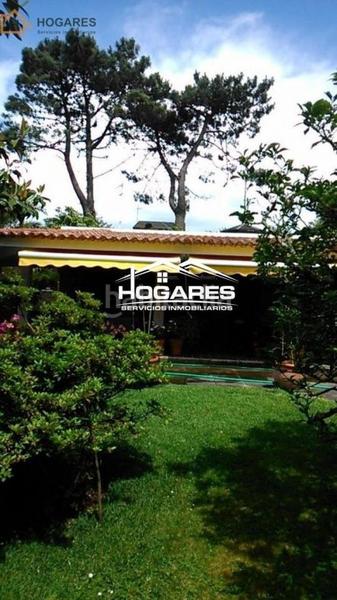 Foto a08da707-9a74-4cc3-b7fc-d96a58498d2d. Chalet mit parking in Panxón Nigrán