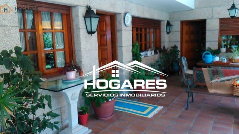 Foto a3d289de-ab0c-4719-b43f-46d07bf70cb4. Chalet with parking in Panxón Nigrán