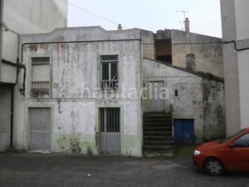 Foto f693228d-ee7a-4d7f-93a9-ca906faa3c52. Casa adossada a Guarda (A)