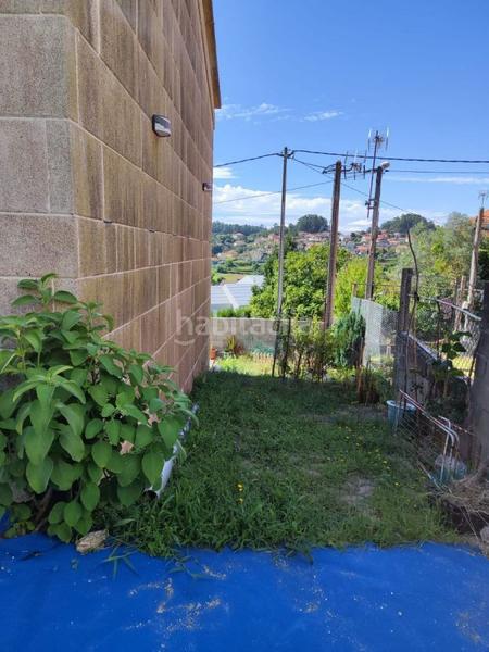 Foto 33d3d7a9-4db1-4f6c-a056-fe7754930a7a. Chalet avec parking dans Bueu