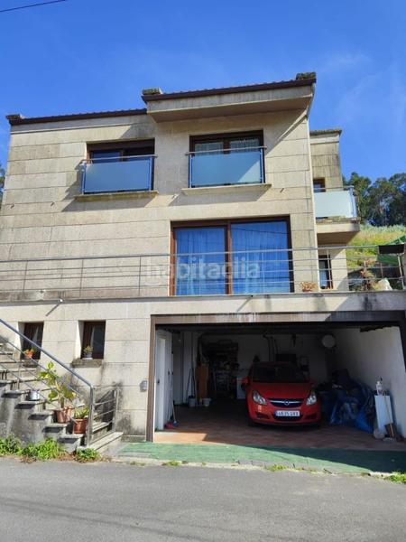 Foto be59f5d5-1bb0-4ced-8713-4bcb5a2f517c. Chalet avec parking dans Bueu