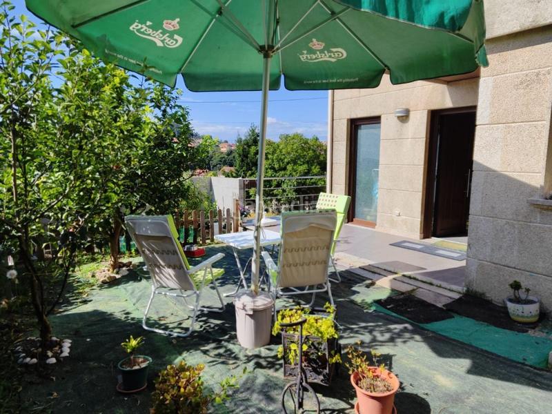 Foto fb52bcbe-35a4-45c8-ac2a-611fc9ba2dc9. Chalet avec parking dans Bueu