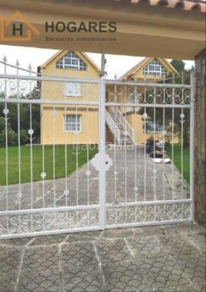 Foto 80aceec2-d75b-4f83-ae71-126bdcdb9f3e. Chalet mit parking in O Hío Cangas