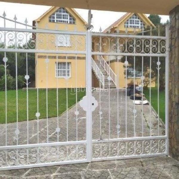 Foto 14fa7b95-d529-4dc0-a880-16e59ff3c235. Chalet with parking in O Hío Cangas