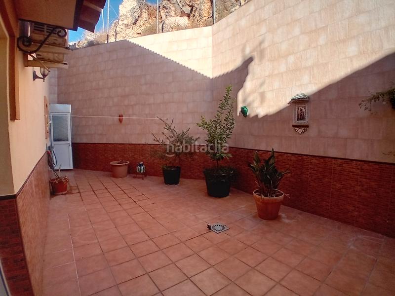 Foto 5c5c3bb1-7578-44ad-b98a-9dd74b33907f. Casa a schiera con camino in Yunquera