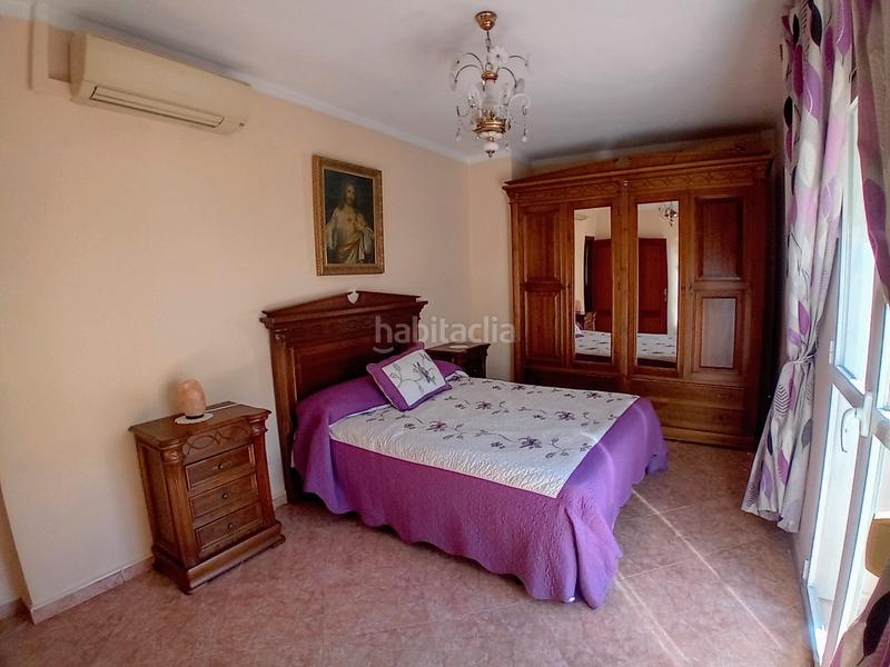 Foto 6c293da3-352e-44d5-88c1-4cc62d6f330e. Casa a schiera con camino in Yunquera