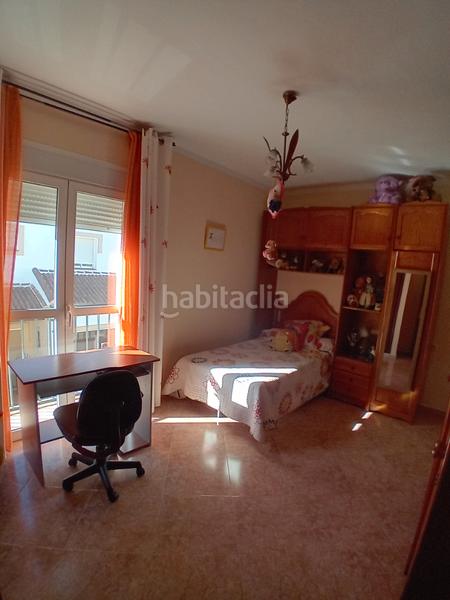 Foto d1d424ff-0028-444c-9942-3ddee506d96c. Casa a schiera con camino in Yunquera