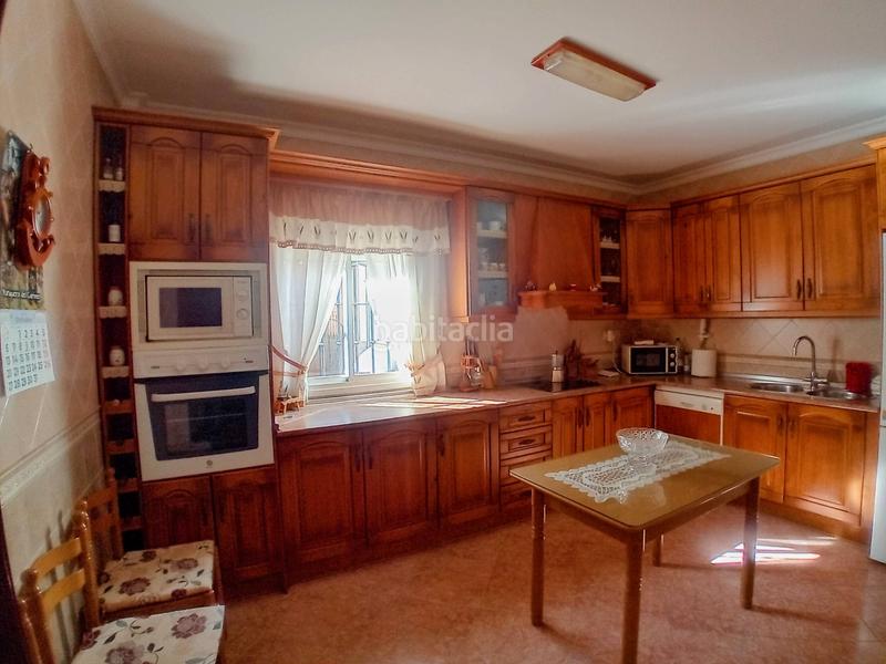 Foto d2b2666e-405a-4fe8-9cc6-aee6e92b4586. Casa a schiera con camino in Yunquera