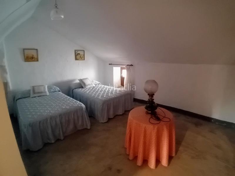 Foto 0be574d9-672a-401e-ab33-8edd3319f6eb. Casa adosada en Yunquera