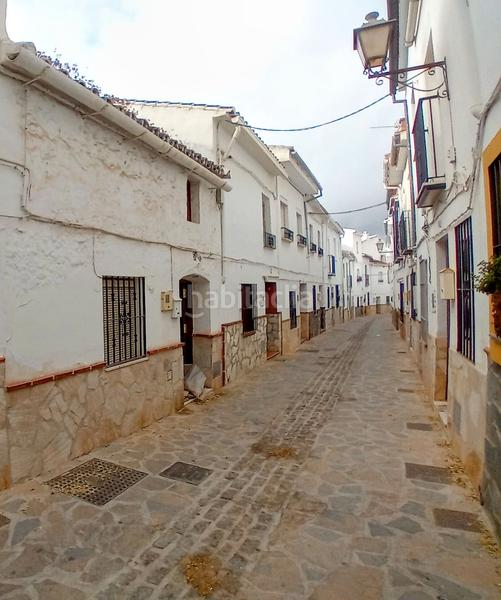 Foto 3a2cc155-bf6e-4754-86bc-c70fcacd71bc. Casa adosada en Yunquera