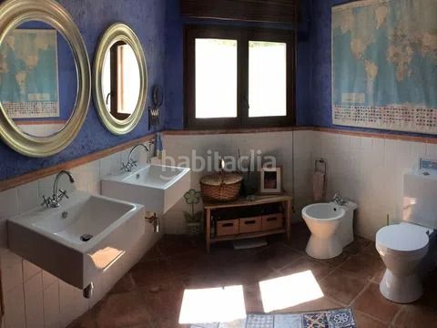 Foto 537f8c58-27e4-43ae-aacd-3c64f43603dd. Masia amb xemeneia a Tolox