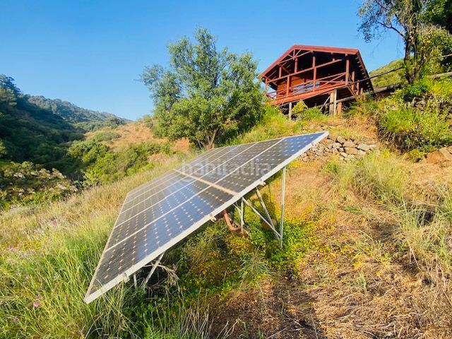 Foto a5397724-f433-4b80-b123-2aeb74ab7c6b. Masia amb xemeneia a Tolox