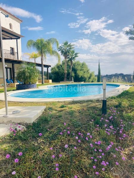 Foto 287fd660-3f1d-418d-bded-d26725a3bf09. Edifici amb piscina a Alozaina