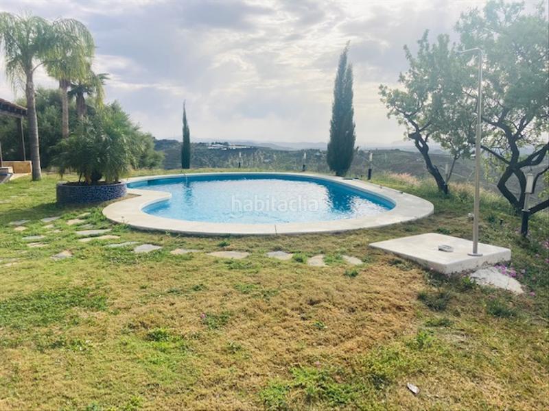 Foto 3b56d24c-b7e1-4e71-9043-da2d77deeba7. Edifici amb piscina a Alozaina