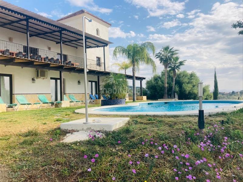 Foto b0d5a5af-5187-4f9c-a685-1523e9073921. Edifici amb piscina a Alozaina