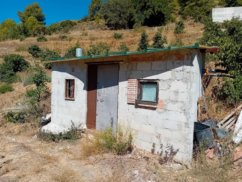 Foto 6f0f73e7-482f-47f8-b3bc-25af146fcf09. Fondo rustico in Yunquera