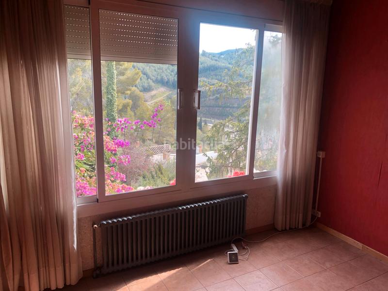 Foto 92bdf608-37d0-4bee-9cdd-4684bcf5397d. Xalet amb xemeneia calefacció aparcament piscina a Vallirana