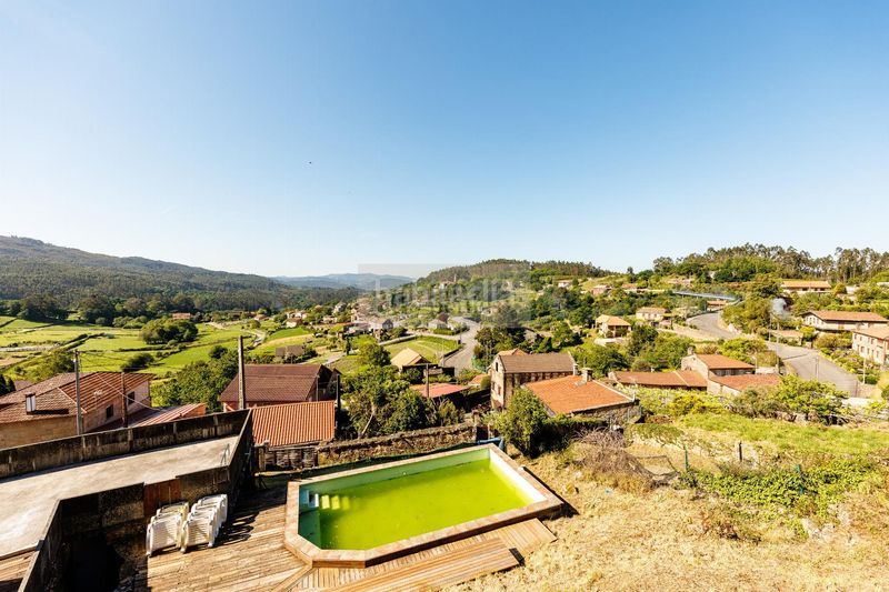 Foto 03cf3cc2-b93f-488d-9e1b-a8f25cc95d22. Casa con riscaldamento piscina in Cotobade