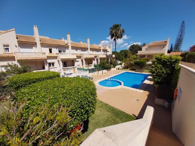 Foto 53a2b89b-e669-4ea3-907f-903c000cd2ec. Doppelhaus mit heizung parking pool in L´Albir Alfàs del Pi (l´)