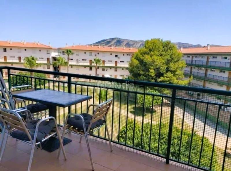 Foto 1645f3da-c0d2-4977-9a82-d74d8a7e3906. Piso el apartamento cuenta con un amplio salóncomedor con acceso directo a una soleada terraza con vistas a los jardines comunitarios. en Alfàs del Pi (l´)