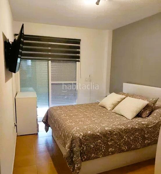 Foto 7be2cd97-ec20-41b4-a2eb-ec2f52ede7c7. Piso el apartamento cuenta con un amplio salóncomedor con acceso directo a una soleada terraza con vistas a los jardines comunitarios. en Alfàs del Pi (l´)