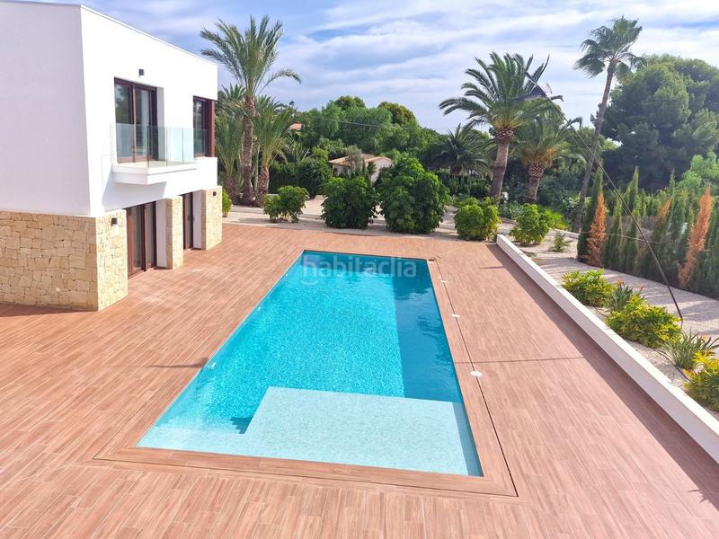 Foto 132dee32-96b4-482d-b3b1-053100ad4771. Casa amb calefacció aparcament piscina a Pueblo-Ubanizaciones Alfàs del Pi (l´)