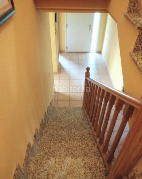 Foto 068c4701-f677-4cbc-a135-9393cb706008. Casa aparellada amb xemeneia calefacció aparcament a Álamo (El)