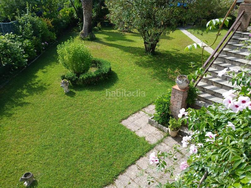 Foto 1ab92c6d-c762-4c32-ad4e-1fa32dd8c54f. Casa pareada  con jardín . en Zona Playa Laredo