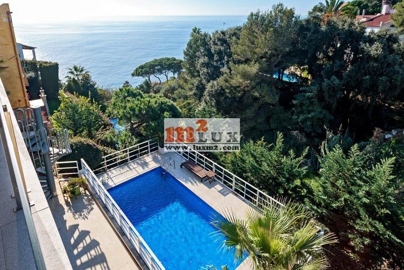 Foto cc22e65e-8460-4520-aecc-e0da7dc68408. Casa con riscaldamento parcheggio piscina in Montgoda Lloret de Mar