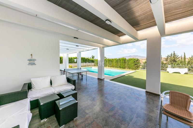 Foto 4f42ab1d-0697-4ad0-ad40-1eaae150d31e. Chalet con piscina in campo de Mijas Mijas