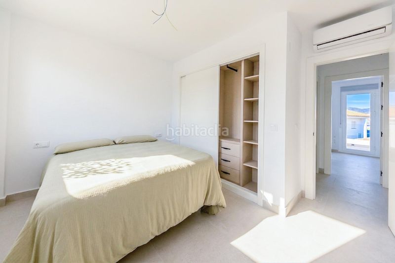 Foto c2b923a3-e0a4-4efc-883f-82974da0c504. Casa aparellada amb aparcament a Manilva pueblo Manilva