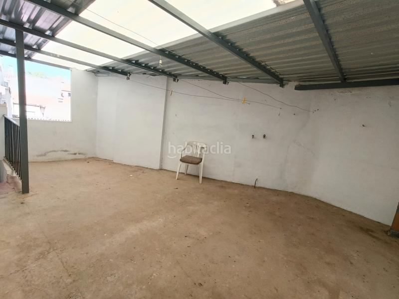 Foto afea276e-5bf2-45c3-8b69-8d5dabf736bb. Casa adossada a Consuegra