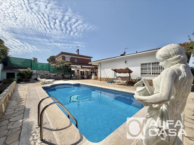 Foto 0a7e28c3-fd5e-4fe1-a52f-fda4385b8083. Casa amb calefacció aparcament piscina a Lloret Residencial - Montlloret Lloret de Mar